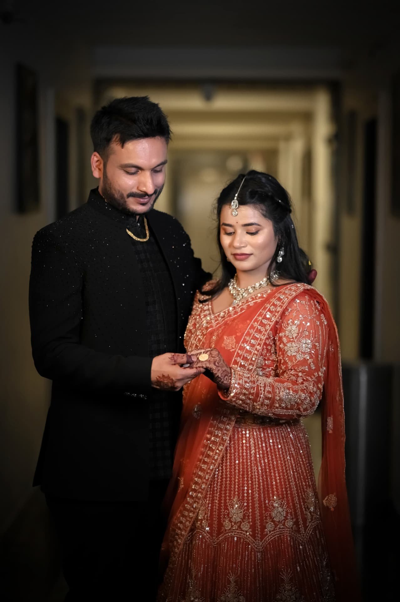 Palak and Aman sharing an engagement moment